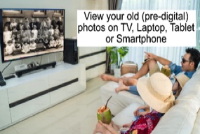 family viewing digital photos on TV